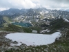 Blick auf den Illsee,  das Meretschihorn 2567m, Schwarzhorn 2790m, das Rothorn 2998m in den Wolken